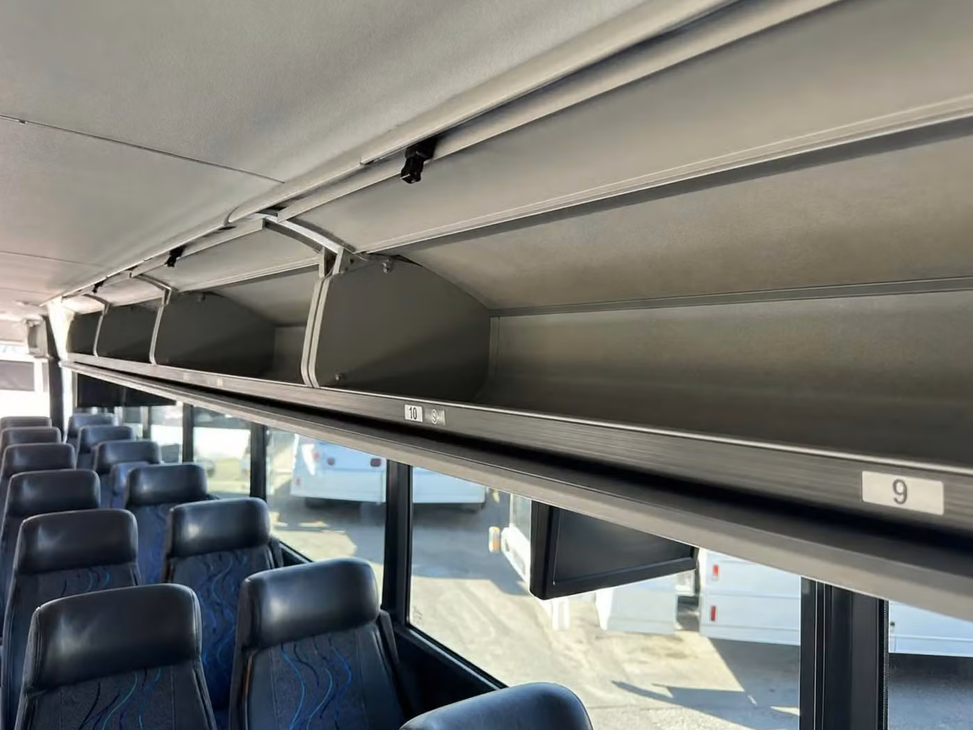 winter park 25 passenger minibus overhead storage