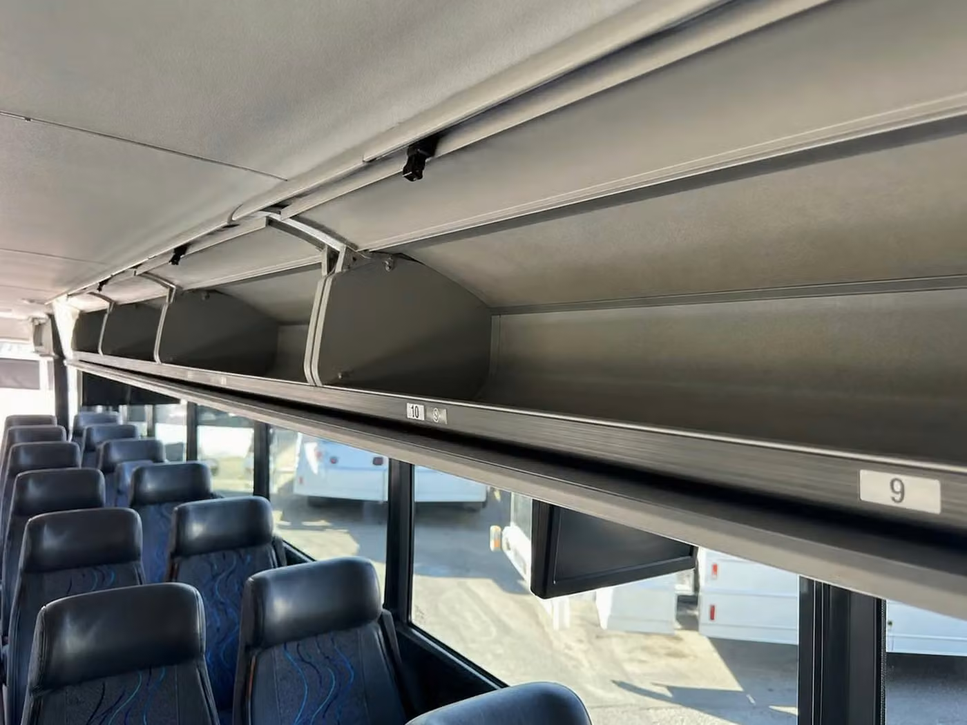 winter park 35 passenger minibus overhead storage